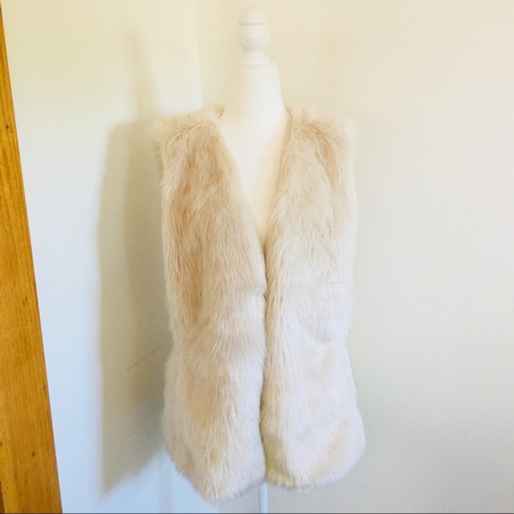 White faux fur vest